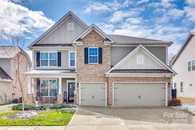 craftsman house featuring board and batten siding, concrete driveway, and stone siding