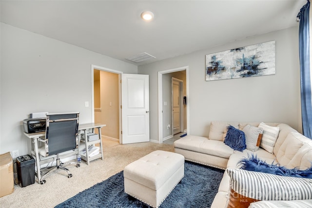 living area featuring light carpet, visible vents, and baseboards