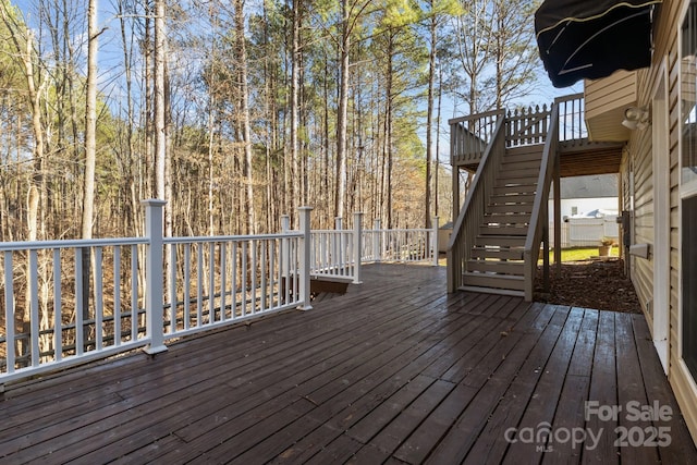 deck featuring stairway