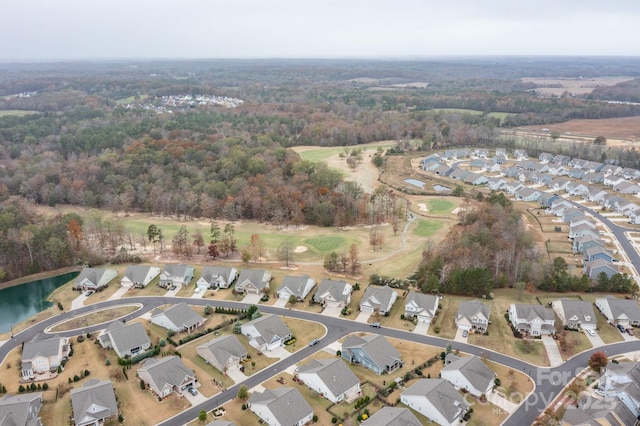 birds eye view of property featuring a water view and a residential view