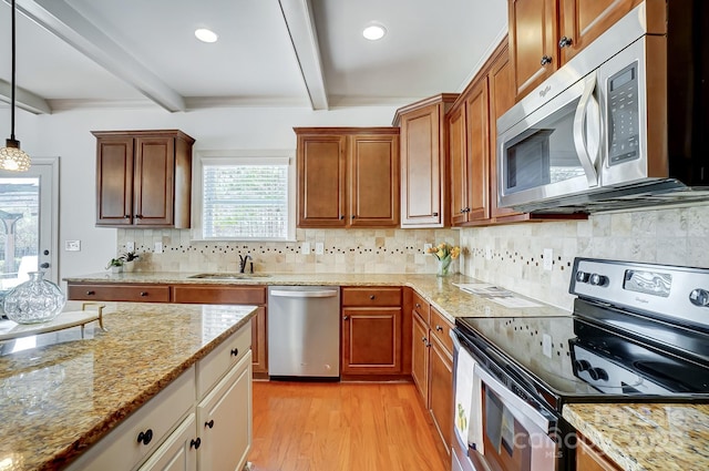 kitchen with stainless steel appliances, a sink, light wood-type flooring, beam ceiling, and tasteful backsplash