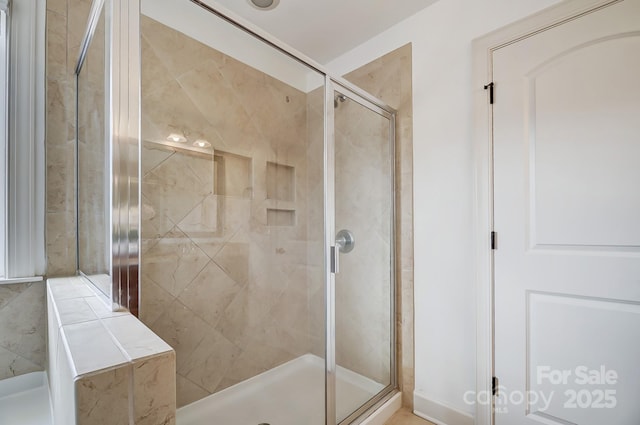 bathroom with a stall shower