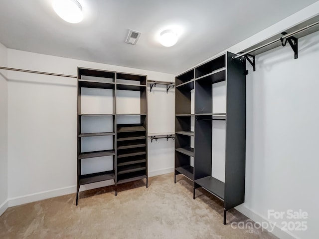 walk in closet featuring visible vents