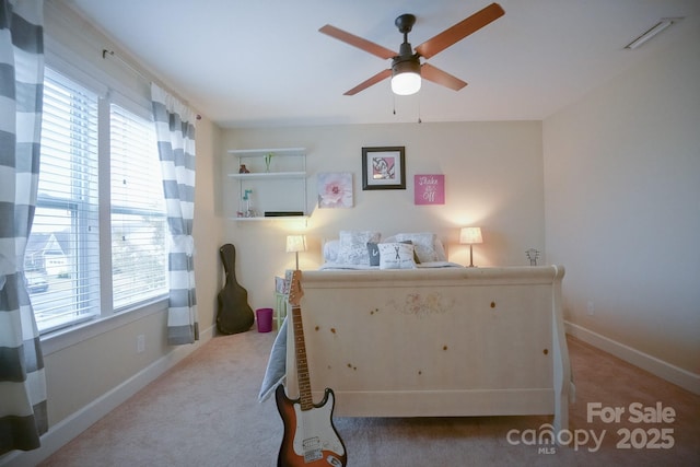 bedroom featuring carpet floors, ceiling fan, and baseboards