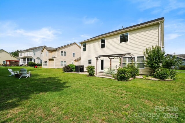 5006 Sand Trap Ct Unit 142, Monroe, NC 28112 - rear view of property featuring a pergola, a patio, and a lawn
