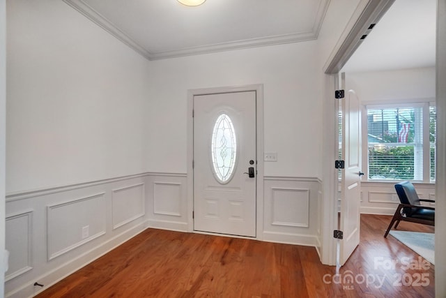 5006 Sand Trap Ct Unit 142, Monroe, NC 28112 - entryway with wood finished floors, a decorative wall, crown molding, and wainscoting
