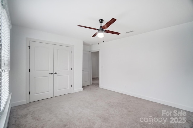 5006 Sand Trap Ct Unit 142, Monroe, NC 28112 - unfurnished bedroom featuring carpet floors, a closet, and ceiling fan
