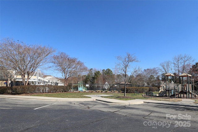 view of street featuring curbs and sidewalks