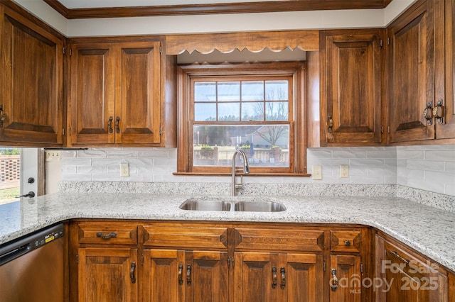 kitchen featuring a sink, light stone countertops, tasteful backsplash, and dishwasher