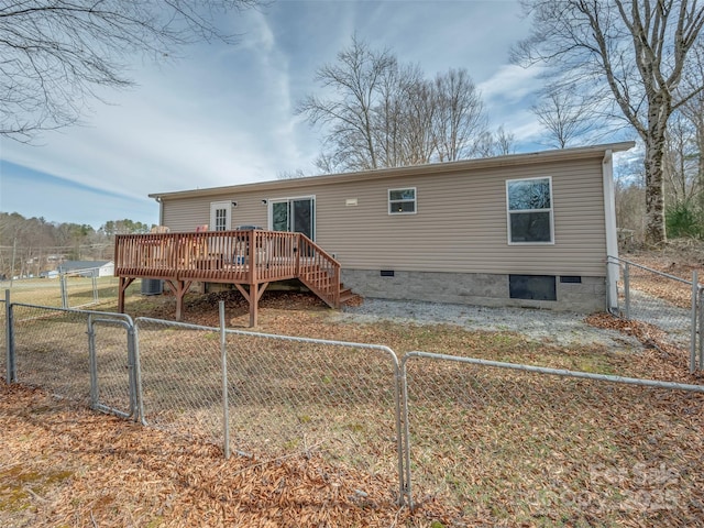 back of house featuring central air condition unit, crawl space, a fenced backyard, and a deck