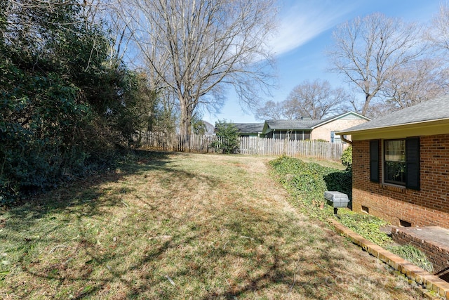 view of yard featuring fence