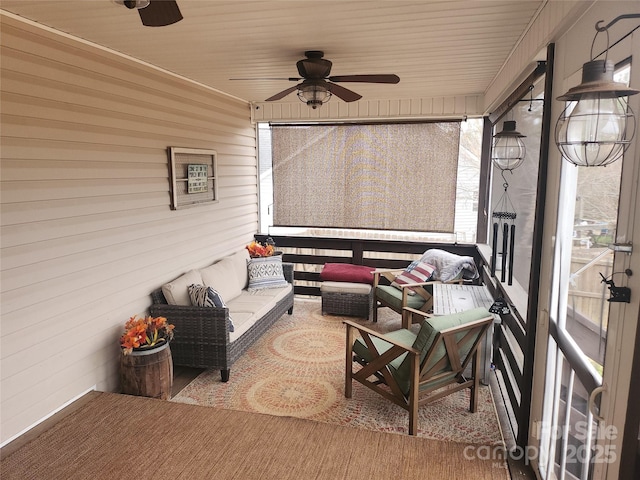 exterior space with ceiling fan