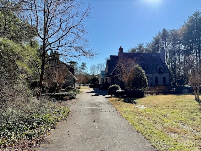 view of street with aphalt driveway