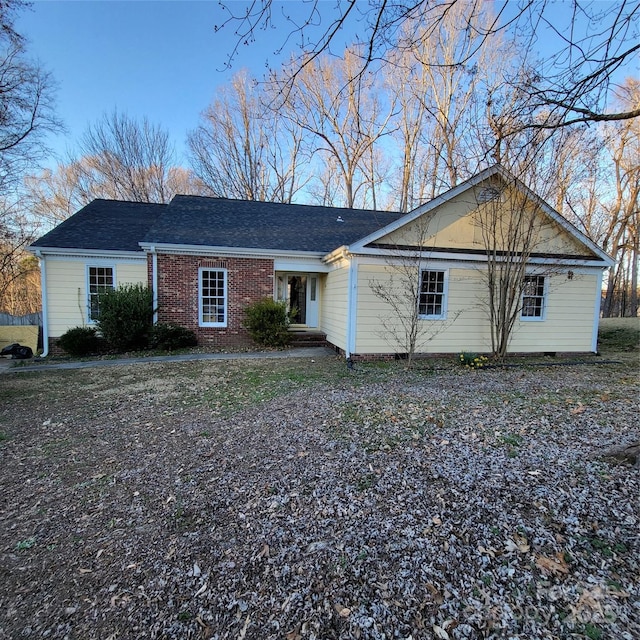 ranch-style home with brick siding