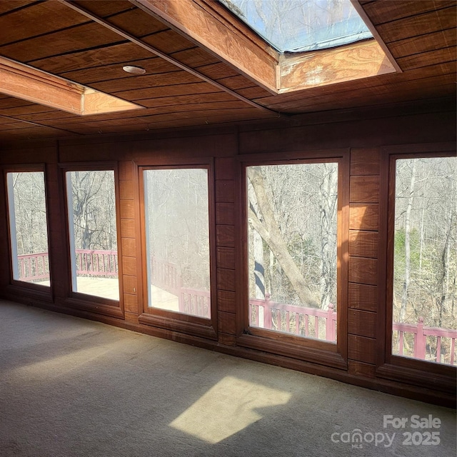 interior space featuring wood ceiling