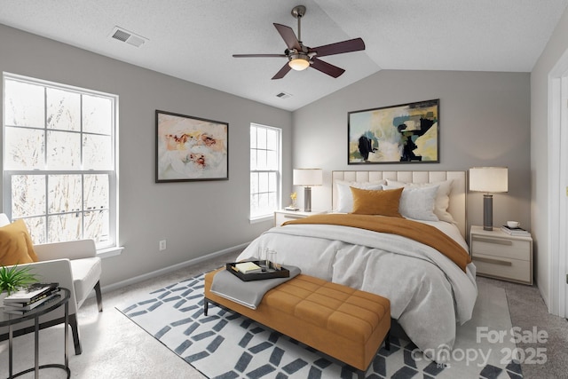 bedroom with visible vents, a ceiling fan, light carpet, vaulted ceiling, and baseboards