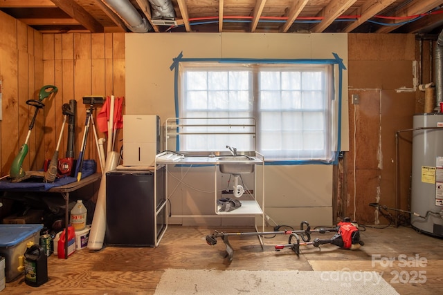 basement featuring gas water heater