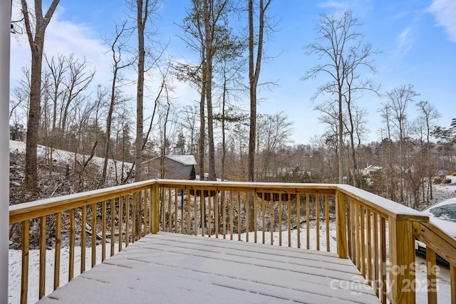 view of snow covered deck