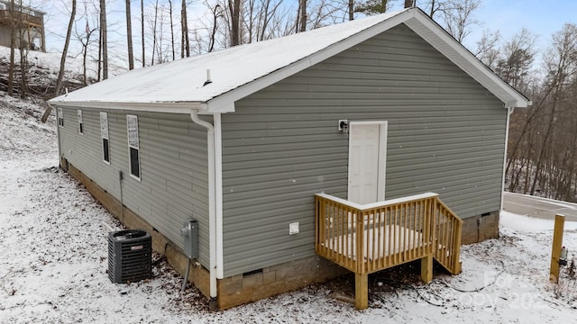 exterior space featuring crawl space and cooling unit