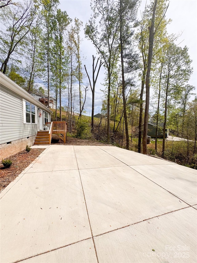 view of patio with a deck