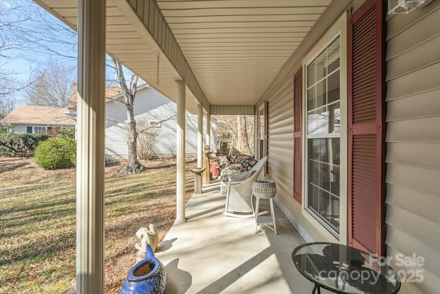 view of patio featuring a porch