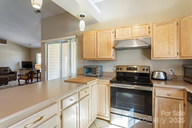 kitchen featuring visible vents, stainless steel appliances, light countertops, light brown cabinetry, and exhaust hood