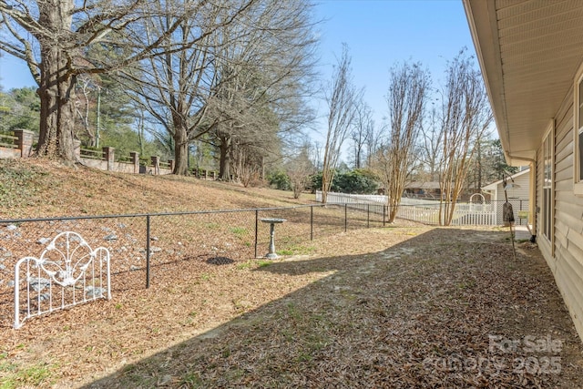 view of yard featuring fence