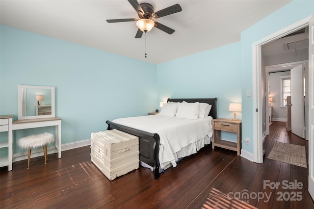 bedroom featuring ceiling fan, baseboards, and hardwood / wood-style floors