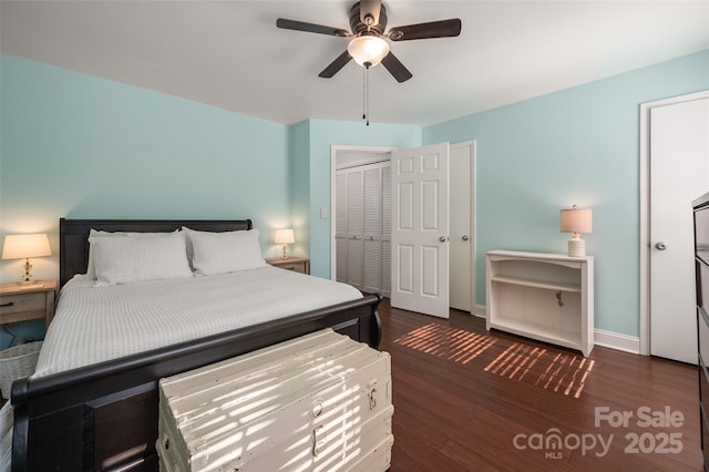 bedroom featuring a ceiling fan, baseboards, and wood finished floors