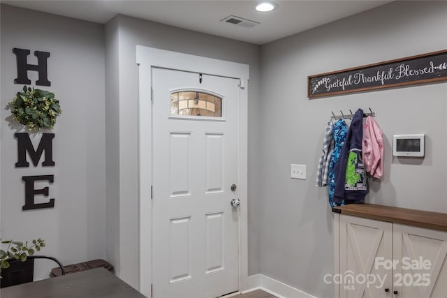 foyer featuring visible vents and recessed lighting