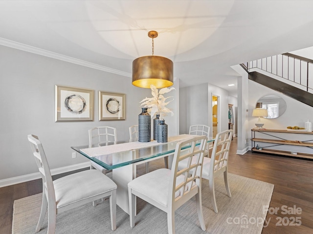 dining area with ornamental molding, recessed lighting, dark wood finished floors, and baseboards