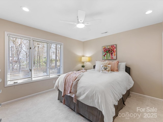 bedroom featuring recessed lighting, light colored carpet, a ceiling fan, baseboards, and visible vents