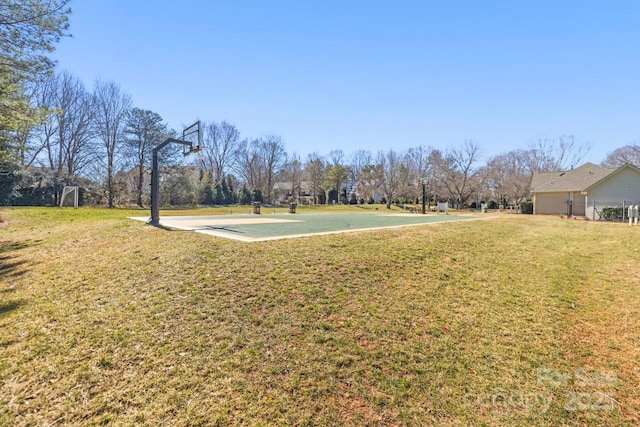 view of yard featuring community basketball court