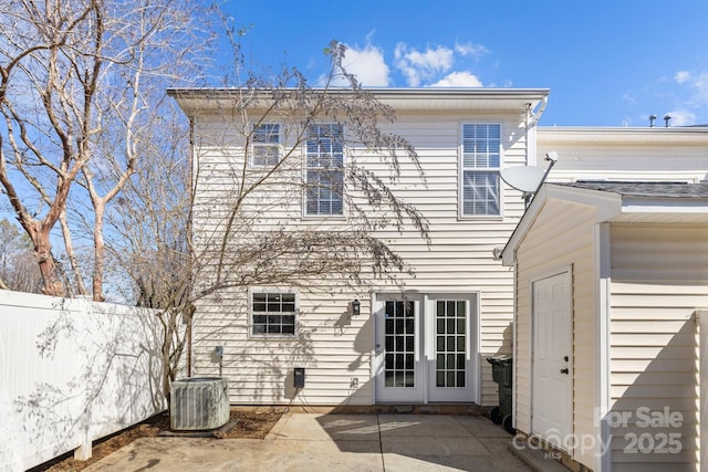 back of property with a patio, fence, and central air condition unit