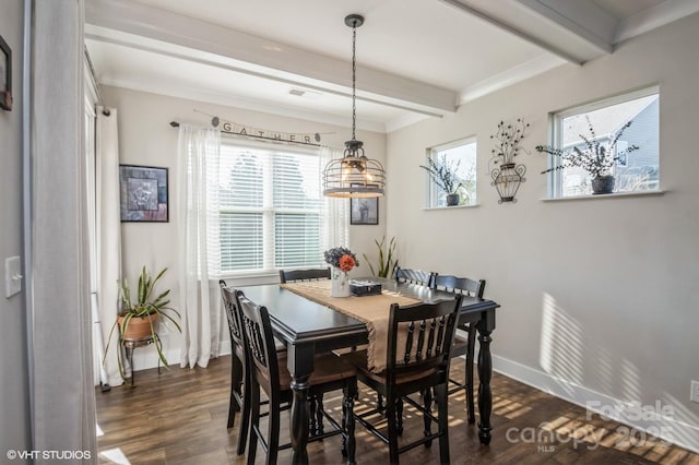 dining space with visible vents, baseboards, dark wood finished floors, and beamed ceiling