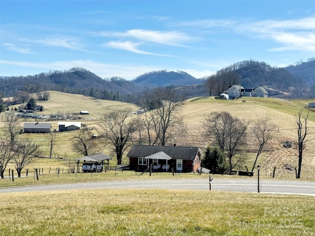 view of mountain feature featuring a rural view