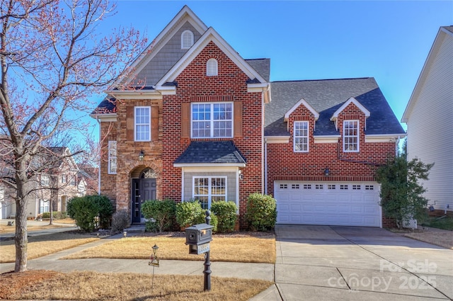 traditional home featuring a garage, brick siding, roof with shingles, and concrete driveway