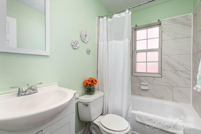 full bath with toilet, shower / bathtub combination with curtain, and vanity