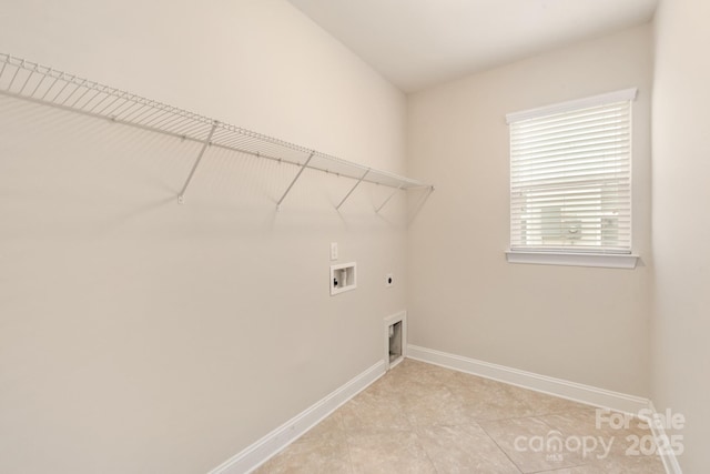 laundry room with laundry area, baseboards, washer hookup, and hookup for an electric dryer