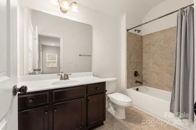 full bath with toilet, tile patterned flooring, vanity, and shower / bathtub combination with curtain