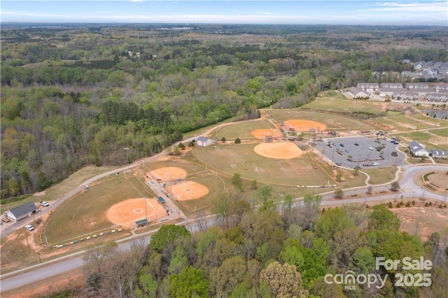 bird's eye view featuring a view of trees