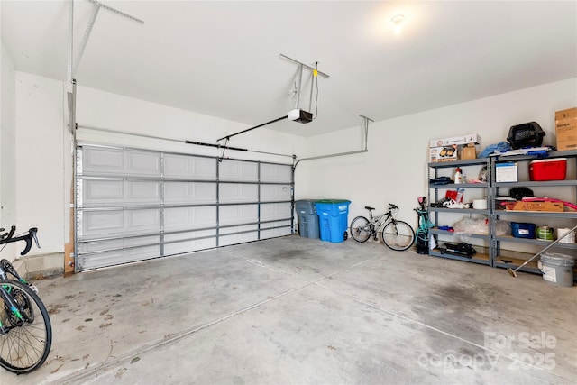 garage featuring a garage door opener