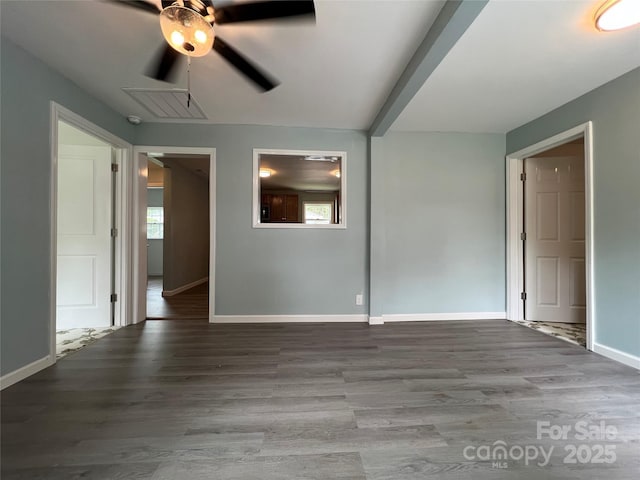 spare room with light wood-type flooring, ceiling fan, and baseboards