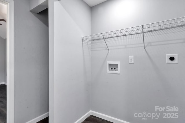 clothes washing area with baseboards, dark wood-style floors, hookup for a washing machine, and hookup for an electric dryer