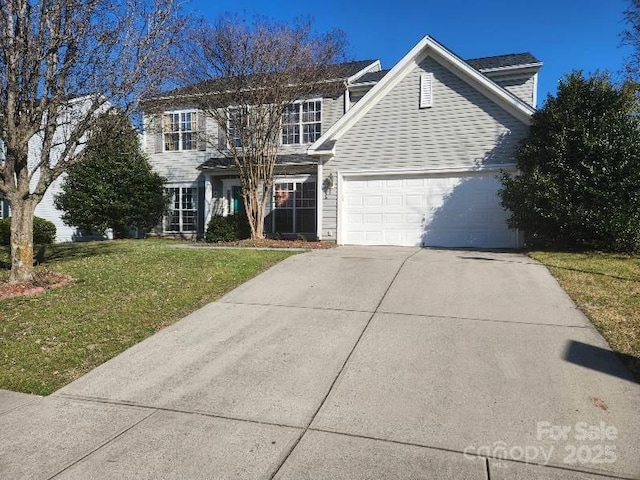 traditional-style home with concrete driveway, a front lawn, and an attached garage