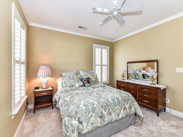 bedroom featuring visible vents, ornamental molding, a ceiling fan, light carpet, and baseboards