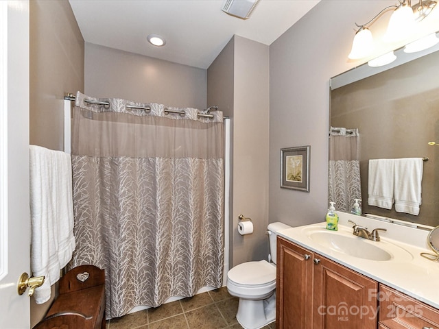 full bath with toilet, curtained shower, tile patterned flooring, and vanity