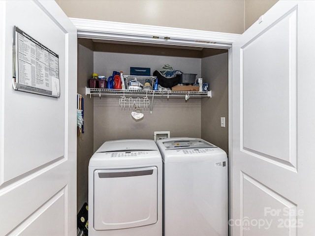 clothes washing area with laundry area and washing machine and dryer