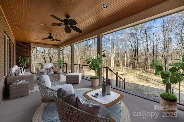 sunroom with wooden ceiling