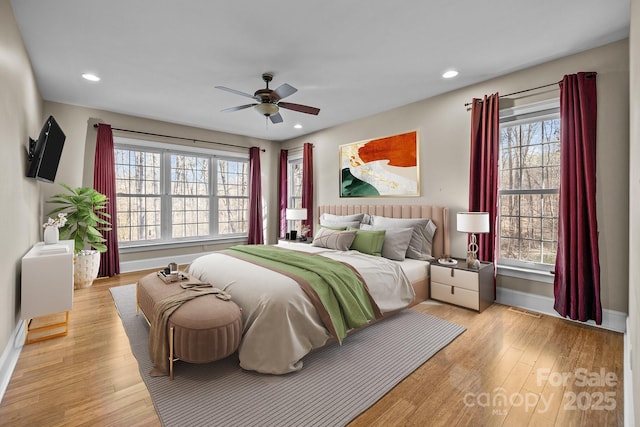 bedroom featuring recessed lighting, baseboards, visible vents, and light wood finished floors